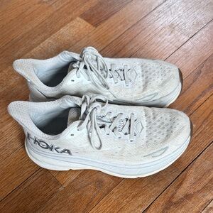 Hoka Women's Clifton 9 Running Shoes in white with gum bottom